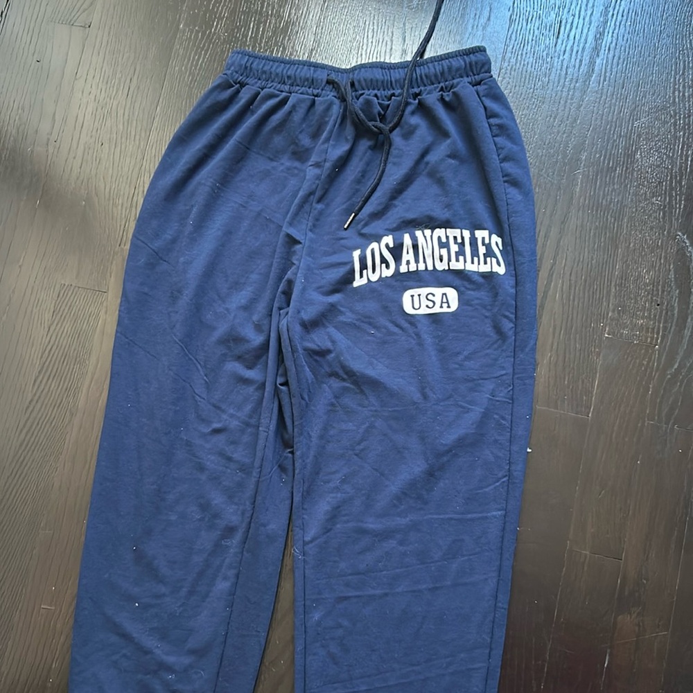 Navy loosely cuffed sweatpants